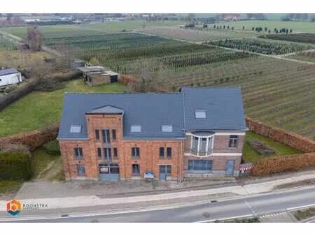 zonevreemde woning met magazijn te putte