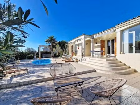 villa d'exception avec vue mer et étang sur les hauteurs de f