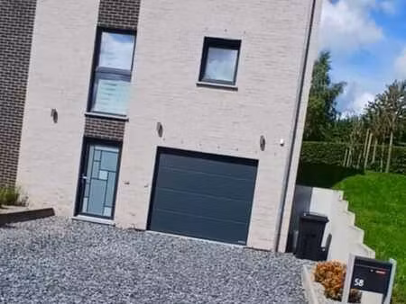 maison 3 façades tout confort et garage double voiture