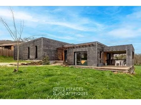 maison contemporaine en bois et son design cubique