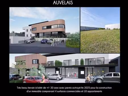 terrain avec permis pour 4 commerces et 10 appartements