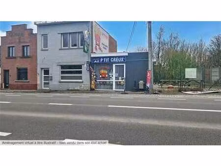 immeuble mixte (logement & commerce en activité)