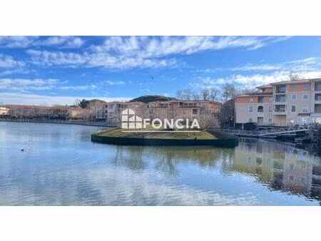 à vendre idéal investissement ! – charmant 2 pièces avec terrasse - garage en s/s à 5 min 