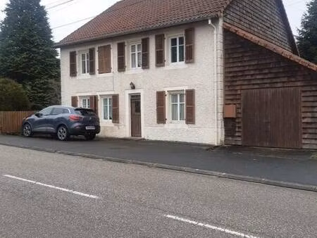 maison de 7 pièces dont 4 chambres avec un terrain clôturé de 44 ares