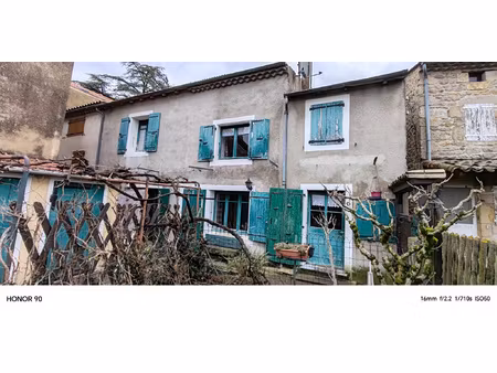 maison divisée en 2 logements