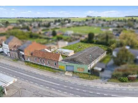 ensemble immobilier avec entrepôt  maison et terrain à bâtir