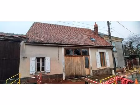 maison à rénover de 70 m2 avec garage et jardin clos