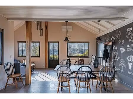 maison bois en première ligne au port avec vue canelot