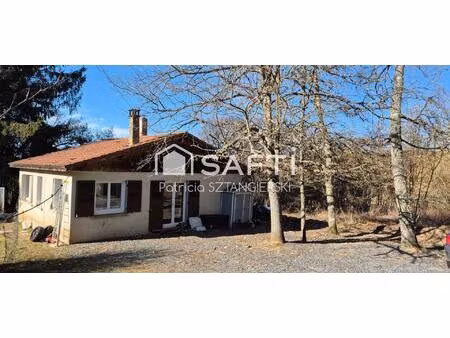 maison nichée dans un écrin de verdure