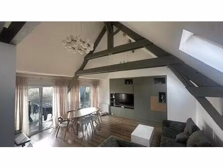 découvrez cette charmante maison de plain pied  allian matériaux raffinés et confort absol