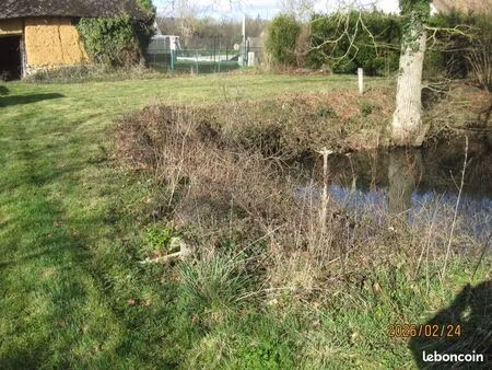 terrain a batir avec 2 batiments