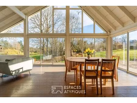 maison de charme avec extension contemporaine surplombant le golf