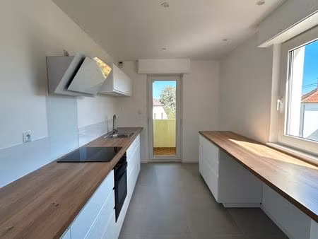 appartement rénové 2 pièces -74 m² garage et balcons