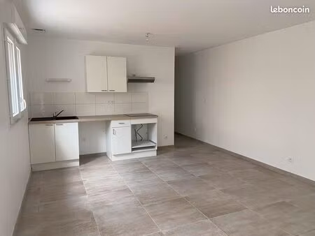 t2 rdc avec une place parking