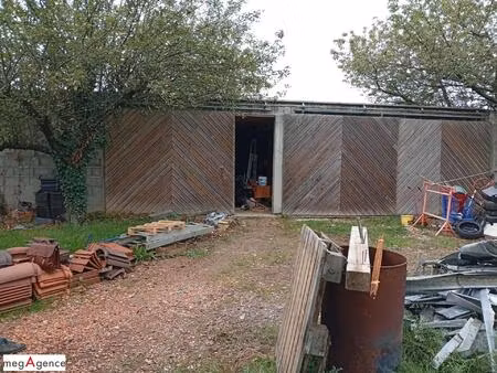 terrain à bâtir avec garage/atelier/stockage..