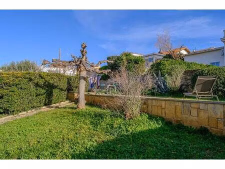 appartement 4 pièce(s) 118 m2 vue mer  jardin partagé  box de garage