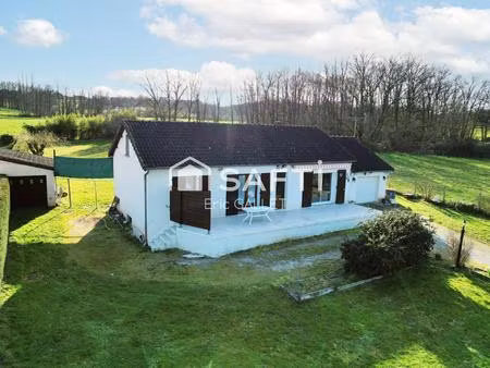 maison de plain-pied 5 pièces avec jardin.