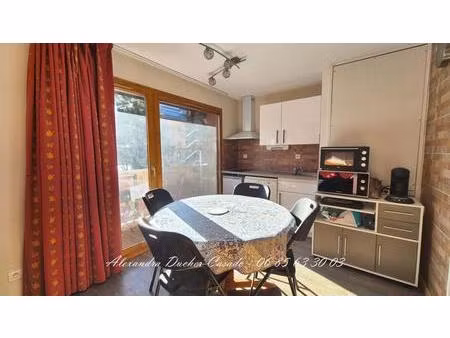 t2 cabine avec 2 chambres + casier a skis + cave