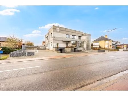 gebouw bestaande uit app  3 kantoorvloeren & werkplaats te bilzen.