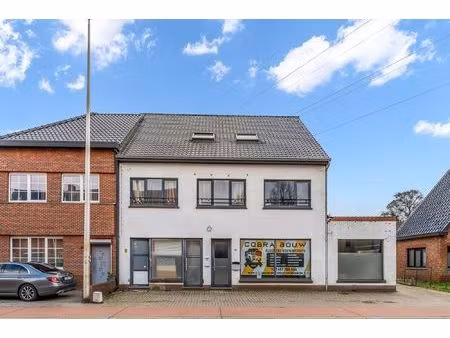 handelshuis met ruim handelspand en 2 woonentiteiten op perceel van 9a68ca te koersel