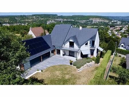 à vendre – maison d’architecte avec piscine intérieure et vue ex