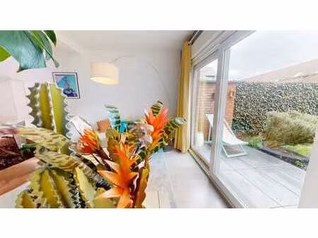 duplex 3 chambres avec garage  jardin et entrée privative!