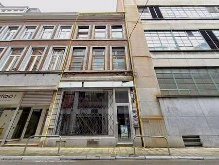 immeuble avec rez commercial + duplex 2 chambres