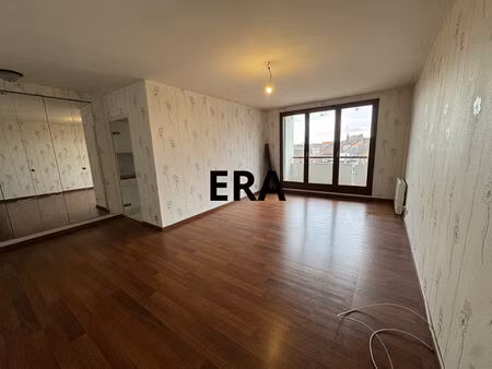appartement de 81m2  2 chambres avec balcon / garage + place de stationnement