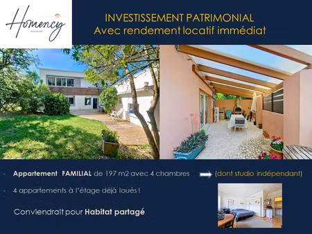 ensemble immobilier avec appartements et jardin à corenc