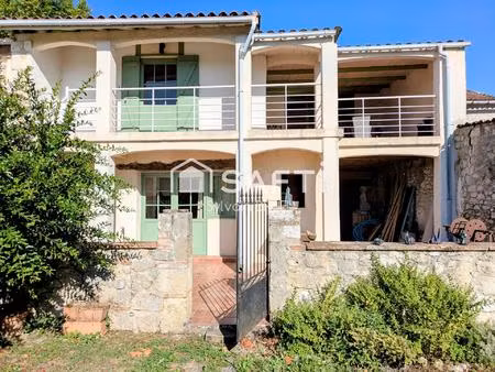 maison de caractère en pierre avec terrasse et jardin