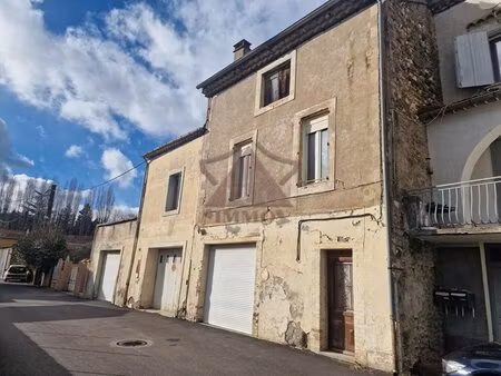idéal investisseur - maison de village avec 2 grands garages
