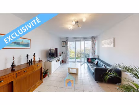 blagnac - appartement 3 pièce(s) 65.57 m2 avec jardinet et terrasse couverte de 12m²