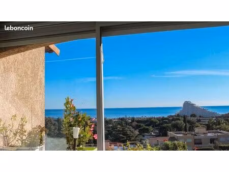 duplex rénové moderne avec clim et vue mer  résidence avec piscine