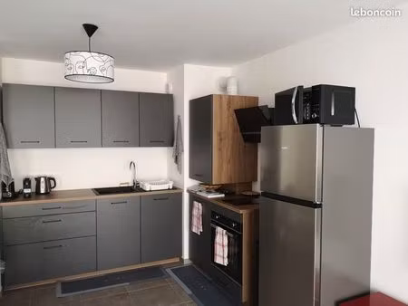 t2 neuf meublé 52m2 centre-ville avec garage fermé et balcon