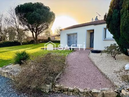 pavillon de 94 m2 avec étang