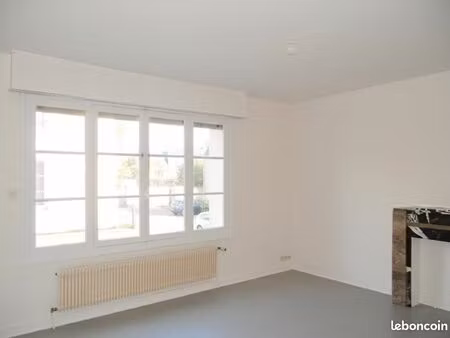 bel appartement f2 + petit jardin immeuble calme