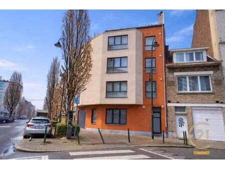 immeuble de rapport 4 unités + garage + grande terrasse