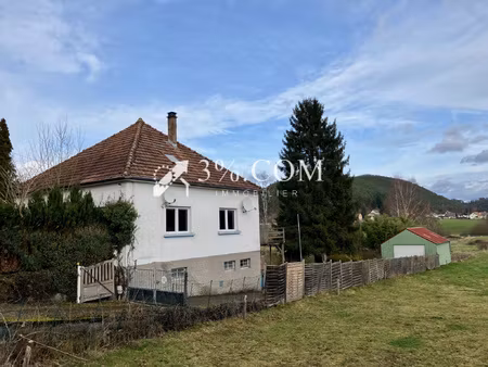 maison avec grand hangar métallique