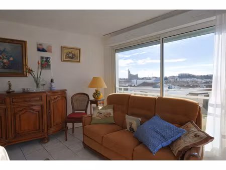 marché central - appartement de 85 m² avec garage