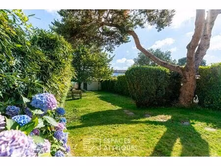 basse-indre : charmante maison des années 30 au séjour cathédrale et joli jardin