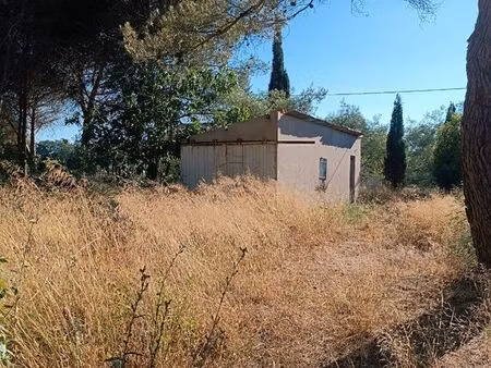 terrain avec bâtisse