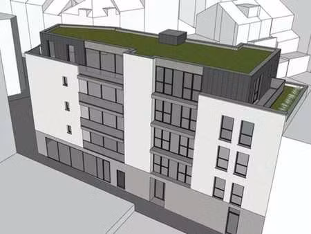 terrain a batir avec permis 8 appts + rez comm (+/-1.172 m2)