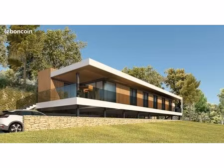 terrain viabilisé avec permis de construire purgé maison contemporaine