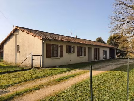 pavillon de plain-pied avec garage et jardin
