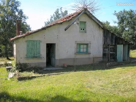 terrain constructible et petite maison