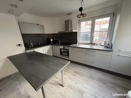 appartement 2 pièces 51m2 idéalement situé avec balcon et parking