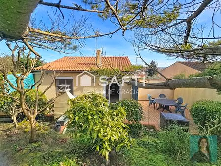 maison duplex t3/4 avec 2 garages plein centre au calme vue dégagée