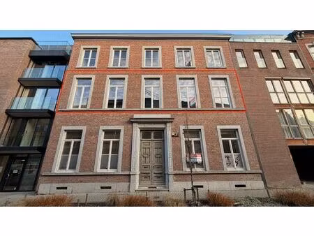 stijlvol nieuwbouwappartement van 180 m² met veranda en privatieve tuin in hartje sint-tru