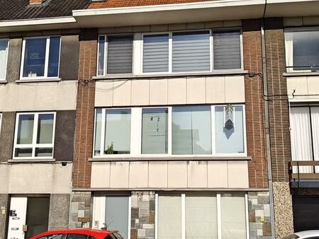 gelijkvloers appartement met tuin en garage