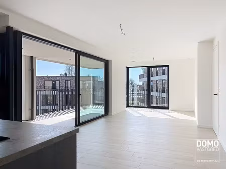 ruim appartement met prachtig terras  lift en garagebox in centrum kermt